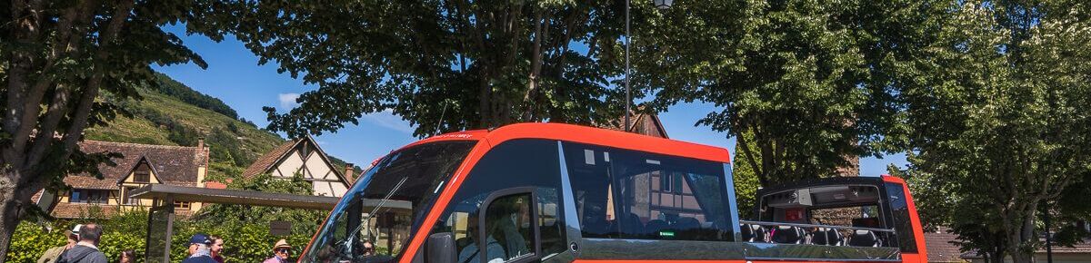 Car-free Alsace Wine Route with Kutzig 1 Red Kut'zig open-top bus on the Alsace Wine Route